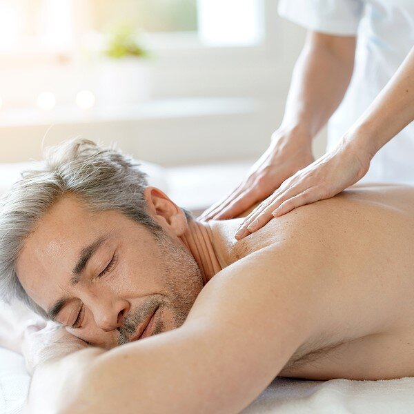 Man relaxing on massage table